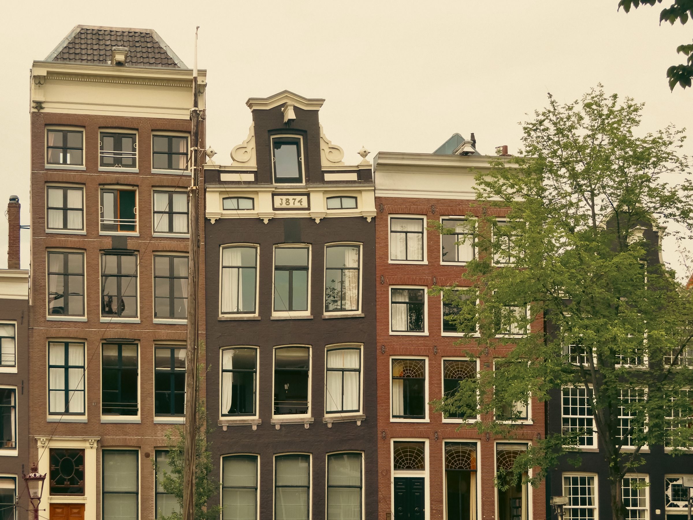 Canal-side office buildings in Amsterdam, where a Dutch BV can have its seat.