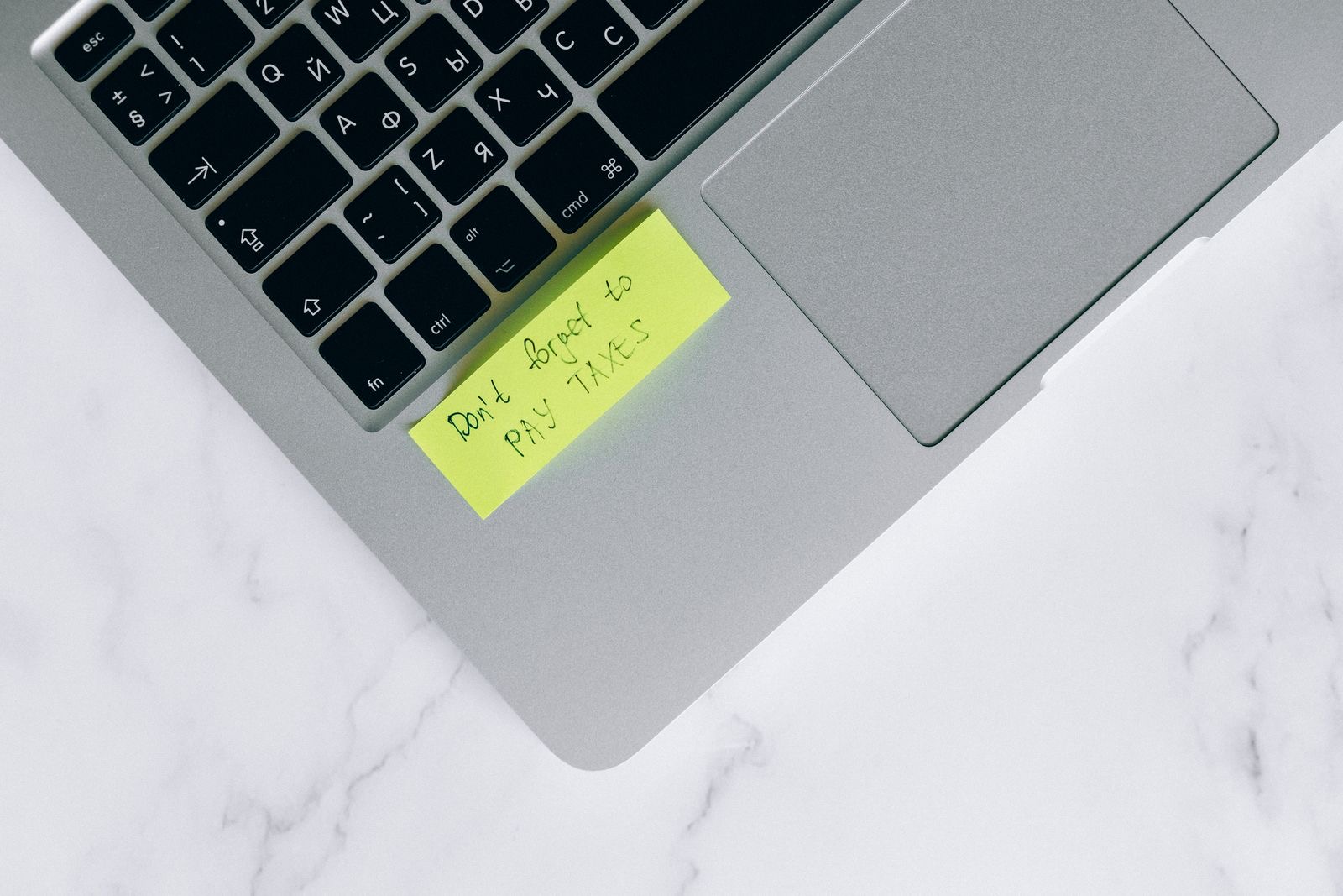 A laptop open on an online business tax return form